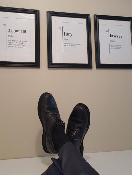 lawyer feet on desk